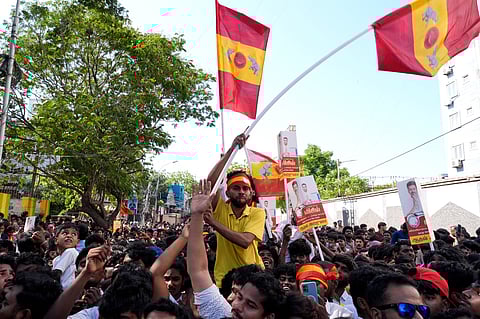 Tamilaga Vettri Kazhagam (TVK) supporters gather during a roadshow ahead of the Tamil Nadu Assembly elections.