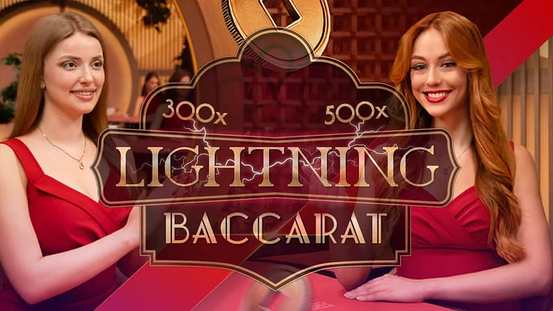 Two women sitting in red dress