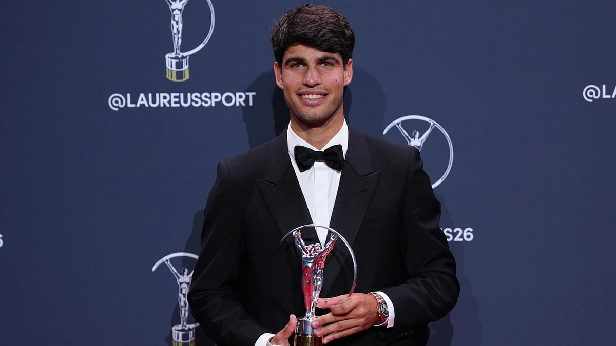 Tennis star Carlos Alcaraz with the trophy. - AP