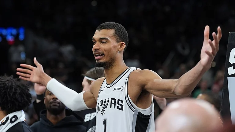 San Antonio Spurs forward Victor Wembanyama celebrates with teammates after their win over the Boston Celtics in an NBA basketball game in San Antonio. - | Photo: AP/Eric Gay