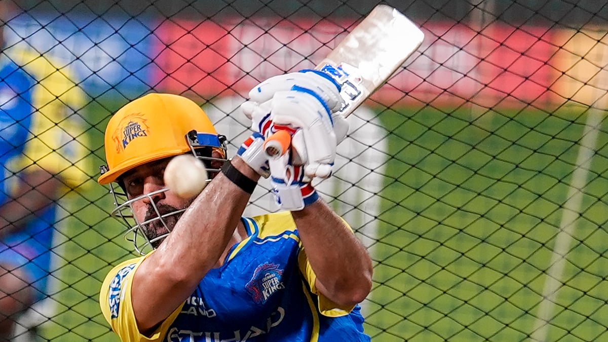 MS Dhoni plays a shot during a practice session ahead of the Indian Premier League match between Mumbai Indians and Chennai Super Kings, in Mumbai. - PTI/Kunal Patil