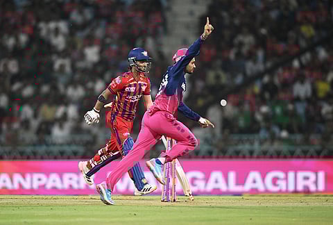 Rajasthan Royals' Ravi Singh celebrates after running out Lucknow Super Giants' Ayush Badoni, left, during the Indian Premier League cricket match between Lucknow Super Giants and Rajasthan Royals in Lucknow.