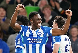 | Photo: Gareth Fuller/PA via AP : Brighton and Hove Albion's Danny Welbeck celebrates scoring their third goal during the Premier League soccer match between Brighton and Hove Albion and Chelsea in Brighton, England.