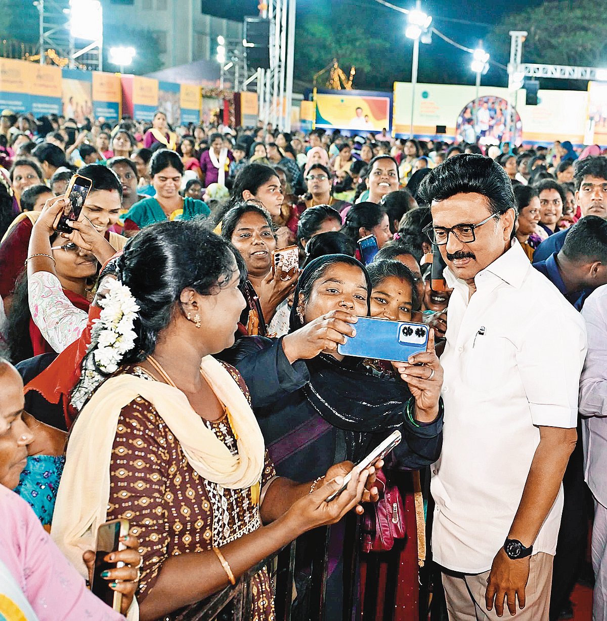 M.K. Stalin with women clicking selfies - null