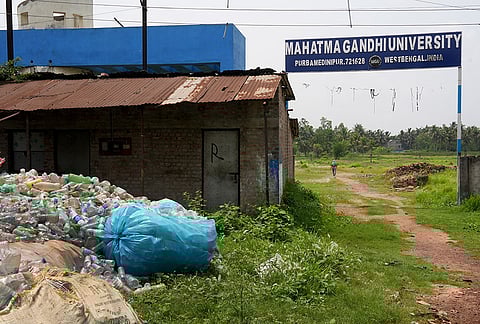 Mahatma Gandhi University, Mahishadal: An Act to set up Purba Medinipur University was passed by the Assembly in 2017, and the name was changed to Mahatma Gandhi University the following year. Currently, classes are run from two floors of the annexe building of Mahishadal College. In 2018, 25 acres of land in the Kapas area, around 5 km away, was allotted. The initial ₹25 crore was used to build boundary walls, after which construction stopped. 