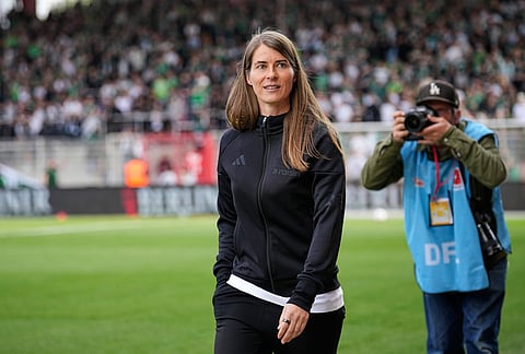 New head coach of German Bundesliga soccer club 1. FC Union Berlin Marie-Louise Eta looks on during the warm up prior to the German Bundesliga soccer match between FC Union Berlin and Wolfsburg in Berlin, Germany.