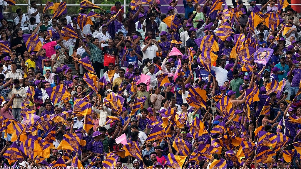Kolkata Knight Riders' fans cheer for their team during its Indian Premier League match against Rajasthan Royals in Kolkata. - AP/Bikas Das