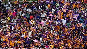 AP/Bikas Das : Kolkata Knight Riders' fans cheer for their team during its Indian Premier League match against Rajasthan Royals in Kolkata.