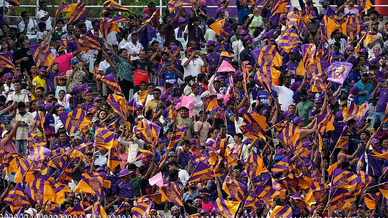 Kolkata Knight Riders' fans cheer for their team during its Indian Premier League match against Rajasthan Royals in Kolkata. - AP/Bikas Das