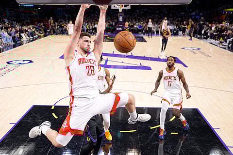 Houston Rockets center Alperen Sengun dunks during the second half in Game 2 of a first-round NBA playoffs basketball series against the Los Angeles Lakers in Los Angeles.