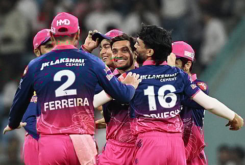 Rajasthan Royals' Ravi Singh, center, celebrates with teammates after running out Lucknow Super Giants' Ayush Badoni during the Indian Premier League cricket match between Lucknow Super Giants and Rajasthan Royals in Lucknow.