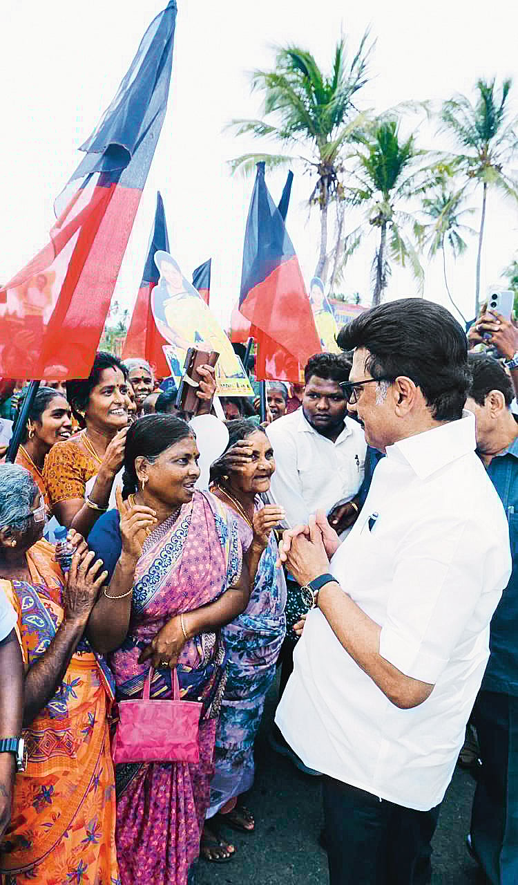 MK Stalin speaking with women at a rally
