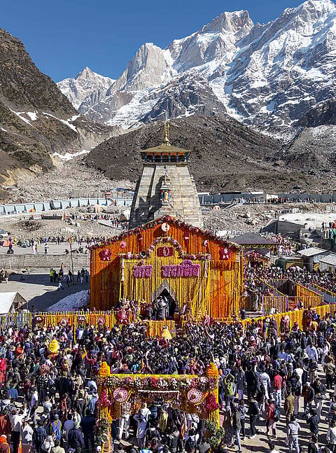 Devotees throng the Kedarnath Jyotirlinga Temple during the portals' opening ceremony, in Rudraprayag, Uttarakhand.