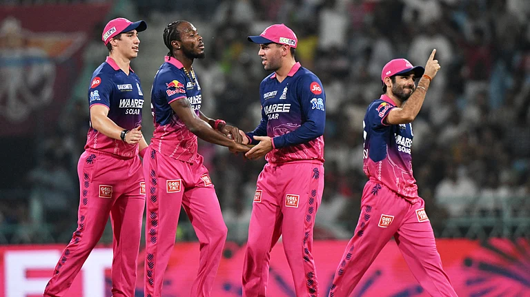 Rajasthan Royals' Jofra Archer, second left, celebrates with teammates the wicket of Lucknow Super Giants' Aiden Markram during the Indian Premier League cricket match between Lucknow Super Giants and Rajasthan Royals in Lucknow, India, Wednesday, April 22, 2026. - (AP Photo)