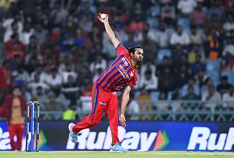 Lucknow Super Giants' Digvesh Rathi bowls a delivery during the Indian Premier League cricket match between Lucknow Super Giants and Rajasthan Royals in Lucknow.