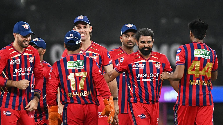 Lucknow Super Giants' Mohammed Shami, second right, celebrates with teammates the wicket of Rajasthan Royals' Dhruv Jurel during the Indian Premier League cricket match between Lucknow Super Giants and Rajasthan Royals in Lucknow, India, Wednesday, April 22, 2026. - (AP Photo)