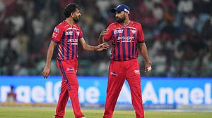 | Photo: AP/Manish Swarup : Lucknow Super Giants' Prince Yadav, left, speaks to teammate Mohammed Shami during the Indian Premier League cricket match between Lucknow Super Giants and Delhi Capitals in Lucknow, India.