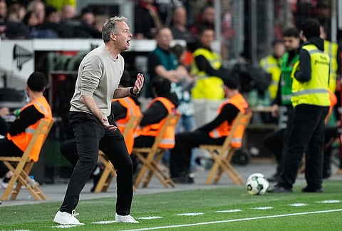 Leverkusen's head coach Kasper Hjulmand reacts during the German Soccer Cup semifinal match between Bayer Leverkusen and Bayern Munich in Leverkusen, Germany.