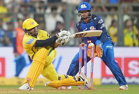 Chennai Super Kings' Sarfaraz Khan bowled out by Mumbai Indians' Mitchell Santner during the Indian Premier League cricket match between Mumbai Indians and Chennai Super Kings in Mumbai.
