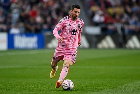 Inter Miami midfielder Lionel Messi dribbles the ball during an MLS soccer match against Real Salt Lake, in Sandy, Utah. 