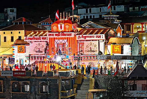 Devotees gather at Badrinath Dham during the portals’ opening ceremony, in Chamoli.