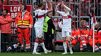 Photo: AP/Matthias Schrader : Stuttgart's Josha Vagnoman, left, and Chris Fuehrich celebrate after scoring during a Bundesliga match against Bayern in Munich, Germany.