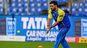 PTI/Kunal Patil : MS Dhoni in action during a training session ahead of the IPL match between Chennai Super Kings and Mumbai Indians at the Wankhede Stadium.