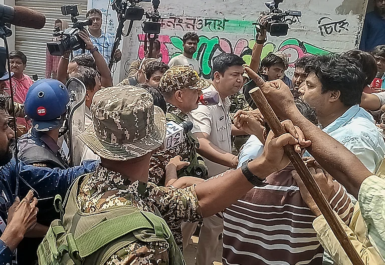 Naoda: Security personnel present at the site after clashes broke out between supporters of the Aam Janata Unnayan Party (AJUP) and the ruling TMC during the first phase of the West Bengal Assembly elections, at Naoda, in Murshidabad district - PTI