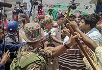 PTI : Naoda: Security personnel present at the site after clashes broke out between supporters of the Aam Janata Unnayan Party (AJUP) and the ruling TMC during the first phase of the West Bengal Assembly elections, at Naoda, in Murshidabad district