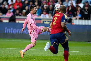 | Photo: AP/Tyler Tate : Inter Miami midfielder Lionel Messi, left, looks to control the ball defended by Real Salt Lake defender DeAndre Yedlin during an MLS soccer match, in Sandy, Utah.