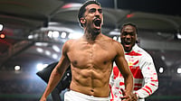 Tom Weller/dpa via AP : Tiago Tomas celebrates scoring the winning goal during the German Cup semi-final between VfB Stuttgart and SC Freiburg.