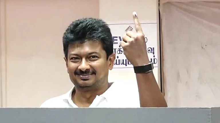 Tamil Nadu Deputy Chief Minister and DMK candidate from Chepauk-Thiruvallikeni constituency, Udhayanidhi Stalin, shows his ink-marked finger after casting a vote in the state Assembly elections, at a polling station, in Chennai. - | Photo: PTI