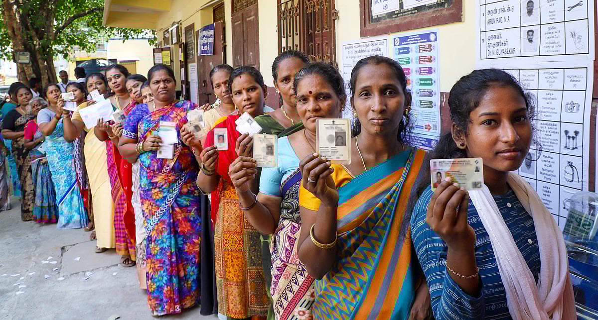 PTI : Women show their identity cards as they queue to vote at a polling station during the Tamil Nadu Assembly elections, in Chennai, Thursday, April 23, 2026.