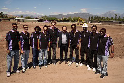 Venky Mysore, center, the chief executive officer (CEO) and managing director of the Kolkata Knight Riders (KKR) poses for a photo with members of the Los Angeles Knight Riders at the groundbreaking ceremony for the official home field for the Los Angeles Knight Riders for 2026, and the future venue of the LA 2028 Olympics Fairgrounds Cricket Stadium at the Pomona Fairplex in Pomona, California.