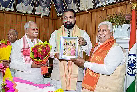 Bihar Assembly Speaker Prem Kumar, right, presents a memento to state Chief Minister Samrat Choudhary, centre, during a one-day special session of the state Legislative Assembly, in Patna. 