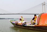 | PTI | :  In this image posted on April 24, 2026, Prime Minister Narendra Modi tries his hand in photography during a boat ride on the Hooghly river ahead of the second phase of the West Bengal Assembly elections, in Kolkata. 