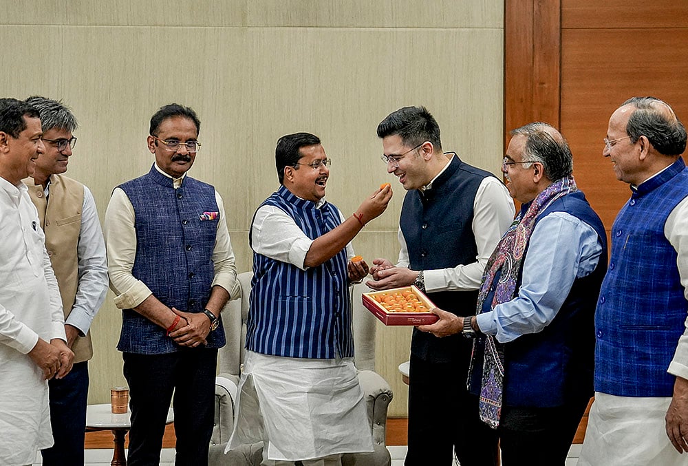 BJP National President Nitin Nabin meets Rajya Sabha MPs Raghav Chadha, Sandeep Pathak and Ashok Mittal at the party's headquarters, in New Delhi. Aam Aadmi Party (AAP) Rajya Sabha MPs Chadha and Sandeep Pathak on Friday announced that they are joining the BJP along with five other MPs of the party.  - | Photo: PTI/Salman Ali