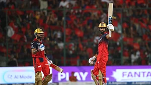 (AP Photo) : Royal Challengers Bengaluru's Devdutt Padikkal celebrates his fifty runs as batting partner Virat Kohli looks during the Indian Premier League cricket match between Royal Challengers Bengaluru and Gujarat Titans in Bengaluru, India, Friday, April 24, 2026.