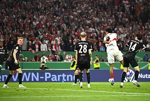 Stuttgart's Tiago Tomas, second from right, scored the winning goal during a German Cup semifinal soccer match between VfB Stuttgart and SC Freiburg, in Stuttgart, Germany. 