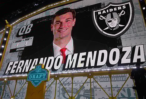Indiana quarterback Fernando Mendoza is shown on a screen after being chosen by the Las Vegas Raiders with the first overall pick during the first round of the NFL football draft, in Pittsburgh. 