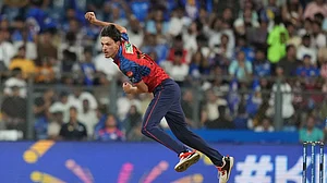 | Photo: AP/Rafiq Maqbool : Punjab Kings' Marco Jansen bowls a delivery during the Indian Premier League cricket match between Mumbai Indians and Punjab Kings in Mumbai.
