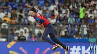 | Photo: AP/Rafiq Maqbool : Punjab Kings' Marco Jansen bowls a delivery during the Indian Premier League cricket match between Mumbai Indians and Punjab Kings in Mumbai.