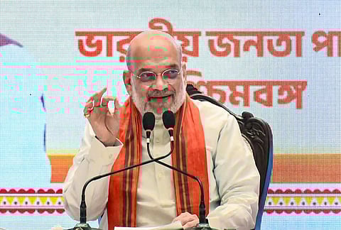 Union Home Minister Amit Shah addresses a press conference, in Kolkata.