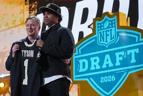 Arizona State wide receiver Jordyn Tyson cries while standing with NFL Commissioner Roger Goodell after being chosen by the New Orleans Saints with the eighth overall pick during the first round of the NFL football draft, in Pittsburgh. 