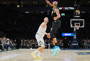 | Photo: AP/Abbie Parr : Denver Nuggets center Nikola Jokic (15), back, looks to shoot as Minnesota Timberwolves center Rudy Gobert (27) defends during the first half in Game 3 of a first-round NBA basketball playoff series in Minneapolis.