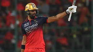 AP Photo : Devdutt Padikkal celebrates his half-century against Gujarat Titans in IPL 2026 clash at the M Chinnaswamy Stadium in Bengaluru.