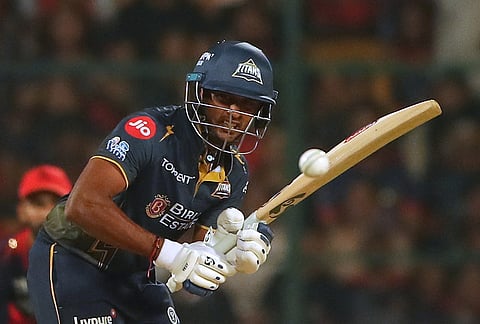 Gujarat Titans' Sai Sudharsan plays a shot during the Indian Premier League cricket match between Royal Challengers Bengaluru and Gujarat Titans in Bengaluru.
