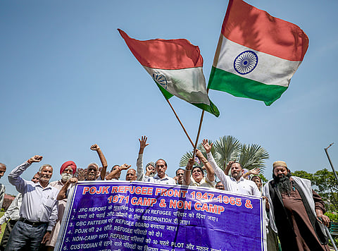 Members of PoJK Refugee Front stage a protest over various pending issues, in Jammu, Jammu and Kashmir.