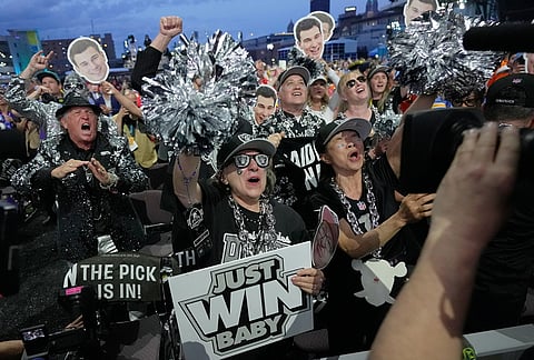 Las Vegas Raiders fans celebrate after Indiana quarterback Fernando Mendoza was chosen by the Las Vegas Raiders with the first overall pick during the first round of the NFL football draft, in Pittsburgh. 