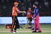 | Photo: AP : Sunrisers Hyderabad's captain Pat Cummins, left, and Rajasthan Royals' captain Riyan Parag shake hands after coin toss before the Indian Premier League cricket match between Rajasthan Royals and Sunrisers Hyderabad in Jaipur.